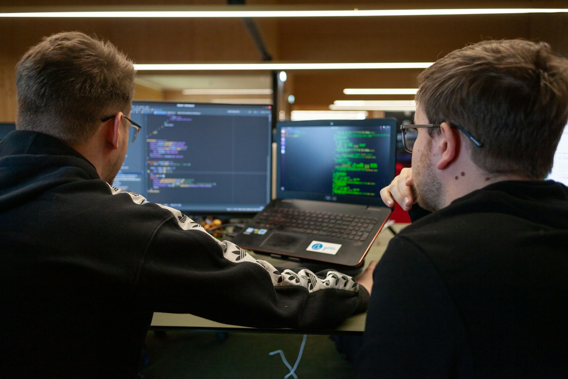 Developers coding with AI screen overlays